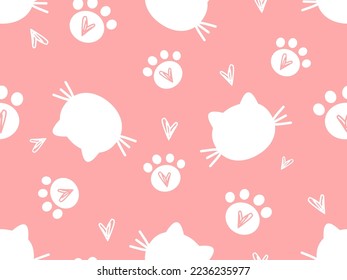 Seamless pattern with cat kitten face, paw prints and hand drawn hearts on pink background vector illustration. 