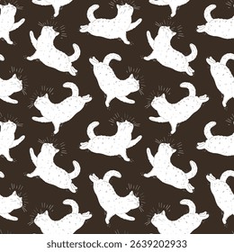 Seamless pattern with a cat on a dark background. Silhouette and contour. Chaotic arrangement of objects