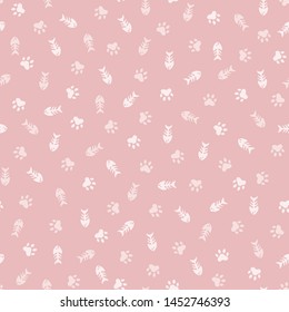 Seamless pattern with cat paw prints and fish bones