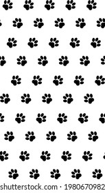 Seamless pattern with cat paw prints. Black and white image. 