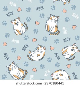 seamless pattern with cats. Cartoon cats on blue background. Funny pet hand-drawn illustration in doodle style. Vector
