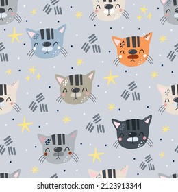 Seamless pattern with cats. Creative childish background. Perfect for kids apparel,fabric, textile, nursery decoration,wrapping paper.