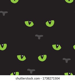 Seamless pattern with cat's eyes and noses on black. Vector. Animal art background.