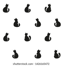 Seamless pattern with cats. On a white background there are black cats in various poses. Vector graphics.