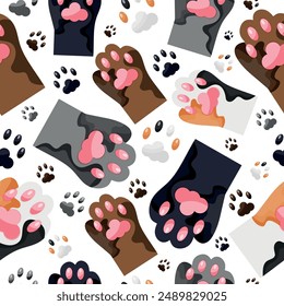 seamless pattern with cats' paws, namely with the paws of a gray, black, spotted and brown cat, for cat day, for various designs, posters or banners