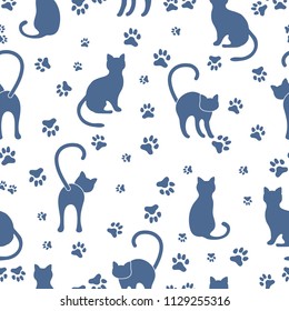 Seamless pattern with cats and traces. Template for design, fabric, print.