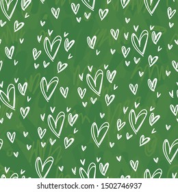 Seamless pattern with chalk heart doodles on green board back. Hand drawn sketch illustration for background, texture, tile, fabric
