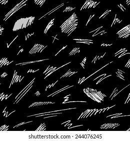 Seamless pattern of chalk strokes and scribbles. Various white shapes on blackboard background. Vector illustration.