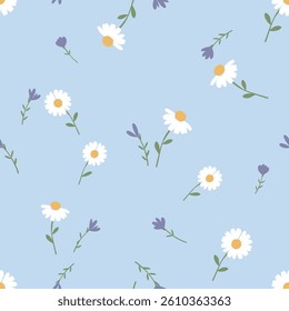 Seamless pattern with chamomile daisies, purple flower and green leaves on blue background vector.