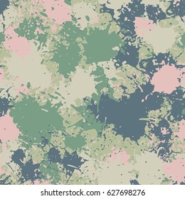 Seamless pattern. The chaos of spots and splashes. Fashionable camouflage. Pink, pale green tones.