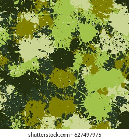 Seamless pattern. Chaotic blots and splashes of different colors. Fashionable camouflage. Green, khaki, black.