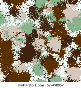 Seamless pattern. Chaotic blots and splashes of different colors. Fashionable camouflage. Brown, green, beige, white.