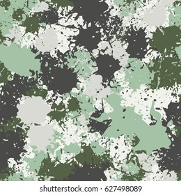 Seamless pattern. Chaotic blots and splashes of different colors. Fashionable camouflage. Gray, white-gray, khaki.
