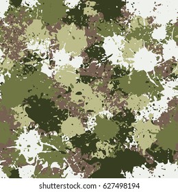 Seamless pattern. Chaotic blots and splashes of different colors. Fashionable camouflage. White, brown, khaki, green.