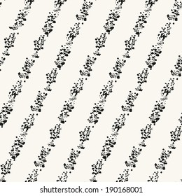 Seamless pattern with chaotic dots. Vector striped texture. Graphic spotted background