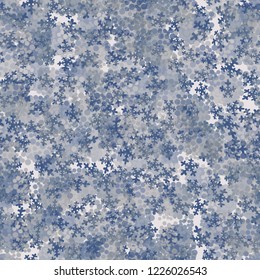 Seamless pattern. Chaotic snowflakes and winter camouflage.