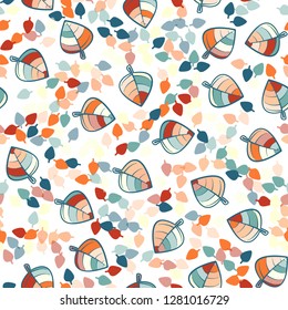 Seamless pattern. Chaotically arranged colored leaves. Colors of the spring landscape.