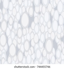 A seamless pattern of chaotically arranged distorted ovals.