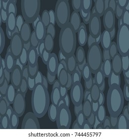 A seamless pattern of chaotically arranged distorted ovals.