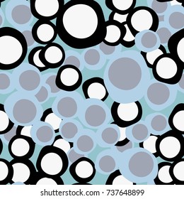 Seamless pattern. Chaotically scattered curves of the circle. Stylish camouflage.