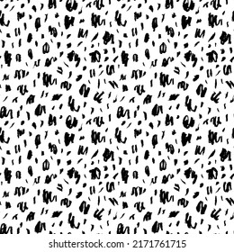Seamless pattern with charcoal blots and strokes. Black painted different dots. Chaotic ink brush scribbles decorative texture. Messy black pencil doodles. Speckles of different size texture. 