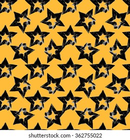 Seamless pattern with charcoal stars on yellow background. Vector illustration for web design, textile design, wallpaper design, etc. 