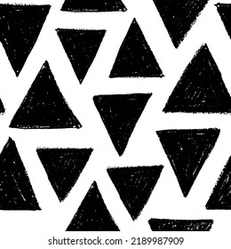 Seamless pattern with charcoal triangles. Hand drawn charcoal or chalk drawing with rough edges and dry texture. Vector black geometric background with various triangle shapes. Sketch design for print