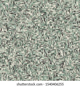 Seamless pattern. Checkered camouflage. Many shades. Chaos of colors. Fashionable texture.