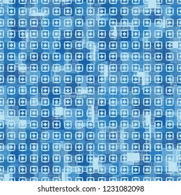 Seamless pattern. Checkered camouflage with squares and rhombuses located on top. Ice shades.