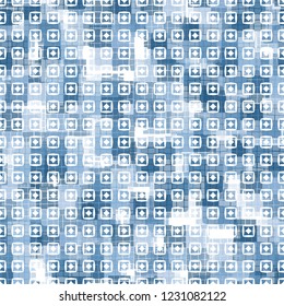 Seamless pattern. Checkered camouflage with squares and rhombuses located on top. Ice shades.