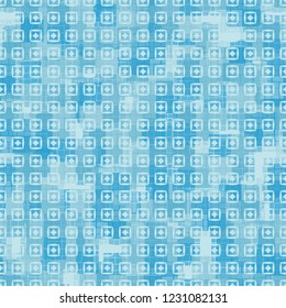 Seamless pattern. Checkered camouflage with squares and rhombuses located on top. Ice shades.