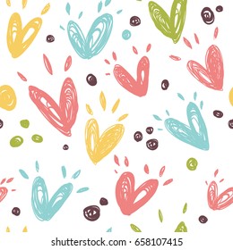 Seamless pattern with cheerful hearts. Painted in free technique.
