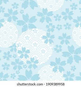 Seamless pattern with cherry blossom on blue background vector illustration.