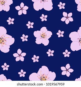 Seamless pattern of cherry flowers on a blue background