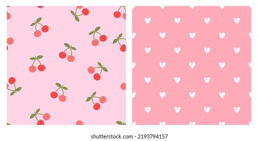 Seamless pattern with cherry fruit and hand drawn hearts on pink backgrounds vector illustration.