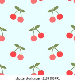 Seamless pattern with cherry fruit on green background vector illustration.