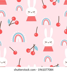 Seamless pattern with cherry fruit, rainbows and cute rabbit cartoons on pink background vector illustration.   