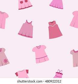 Seamless pattern with children's dresses on gray-pink background. Vector illustration.