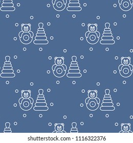 Seamless pattern with children's toys. Roly-poly, pyramid.