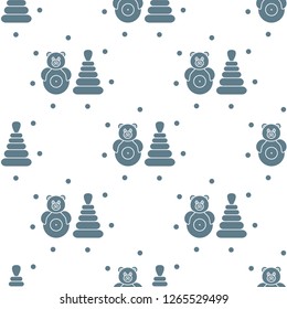 Seamless pattern with children's toys. Roly-poly, pyramid.