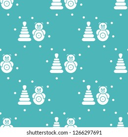 Seamless pattern with children's toys. Roly-poly, pyramid.