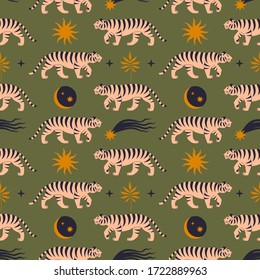 Seamless pattern with chinese tigers in boho asian style. Beautiful animal print design. For fabric, wall art, interior, packaging. Floral branch, crescent moon, star, eye. Magic mystery concept.