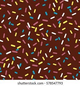 Seamless pattern chocolate glaze for donut. Brown background with decorative colored sprinkles. Vector illustration.