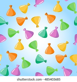 Seamless pattern with chocolates truffles in colorful wrapper.