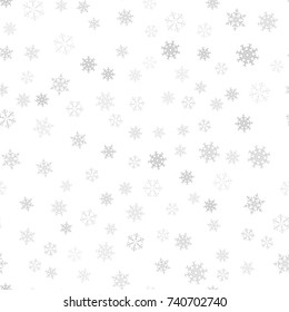 Seamless pattern. Christmas abstract background made of snowflakes on white. Design postcards, posters, greeting for the new year. Vector illustration.
