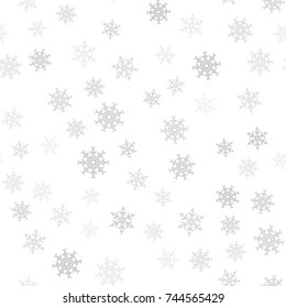 Seamless pattern. Christmas abstract background made of snowflakes on white. Design postcards, posters, greeting for the new year. Vector illustration.
