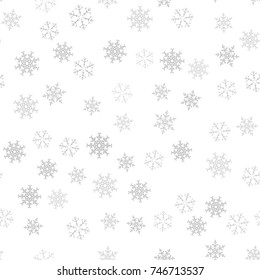 Seamless pattern. Christmas abstract background made of snowflakes on white. Design postcards, posters, greeting for the new year. Vector illustration.