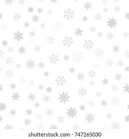 Seamless pattern. Christmas abstract background made of snowflakes on white. Design postcards, posters, greeting for the new year. Vector illustration.
