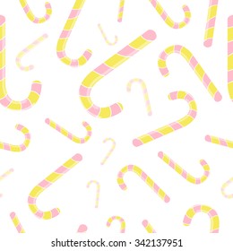 Seamless pattern with christmas candies on white background. For use in the packaging paper, backgrounds, tablecloths. Vector illustration. 