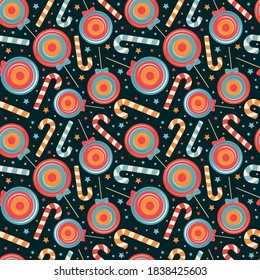 Seamless pattern from christmas candy cane, holiday sweets, Lollipop on dark background. Merry Christmas and happy new year vector illustration. Design for children textile, fabric, wrapping paper